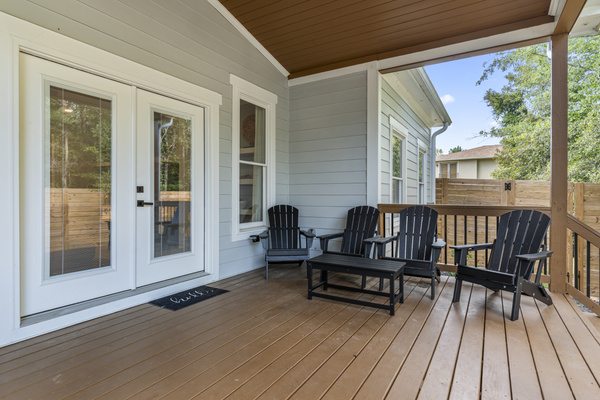 Back deck porch with lounge seating area.