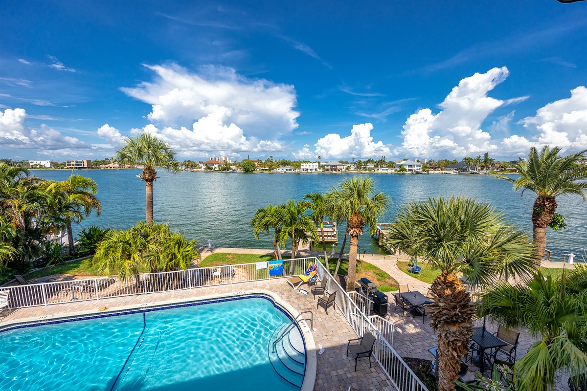 Waterfront pool area with Patios and fishing docks!