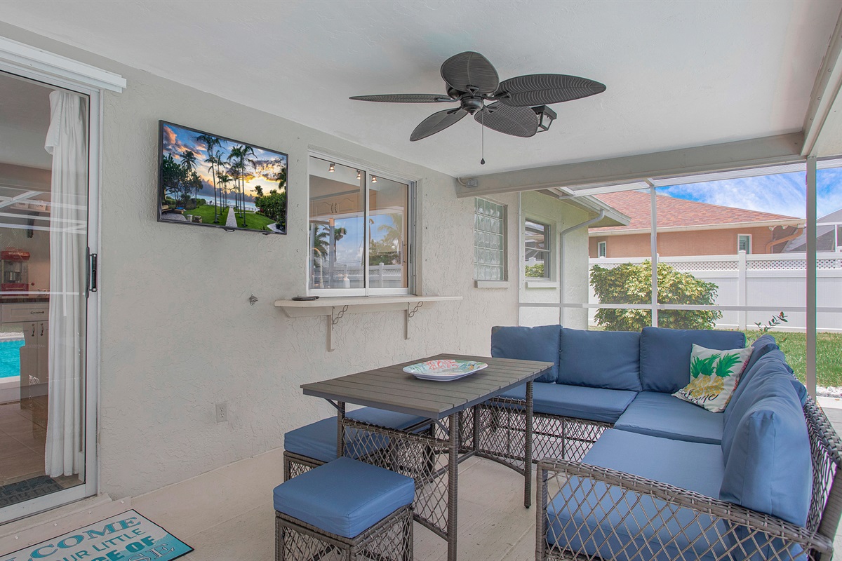 Relax outside with a cocktail as you watch your favorite flick.