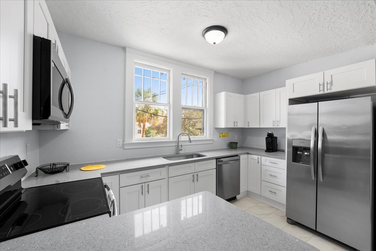 Completely new and updated kitchen and appliances. Mixing historic charm with modern convenience!