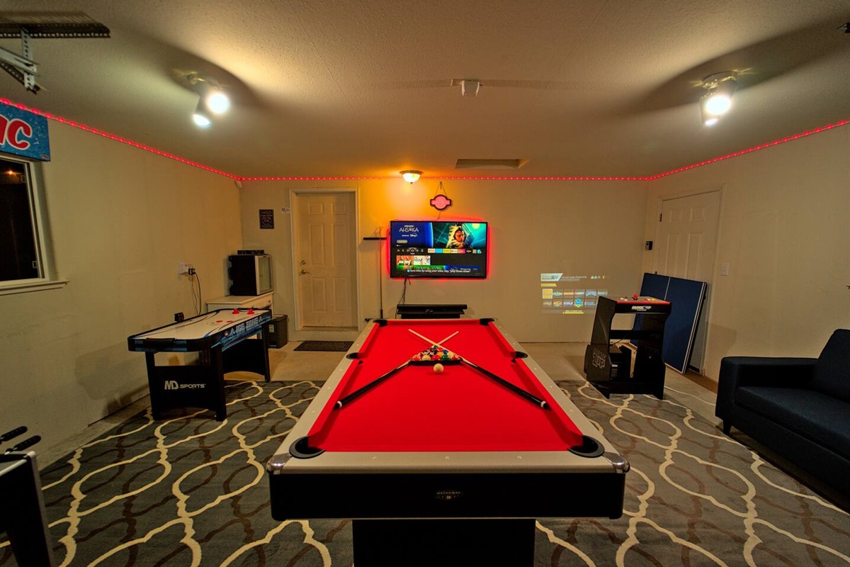 A captivating game room design crafted to appeal to individuals of all ages.