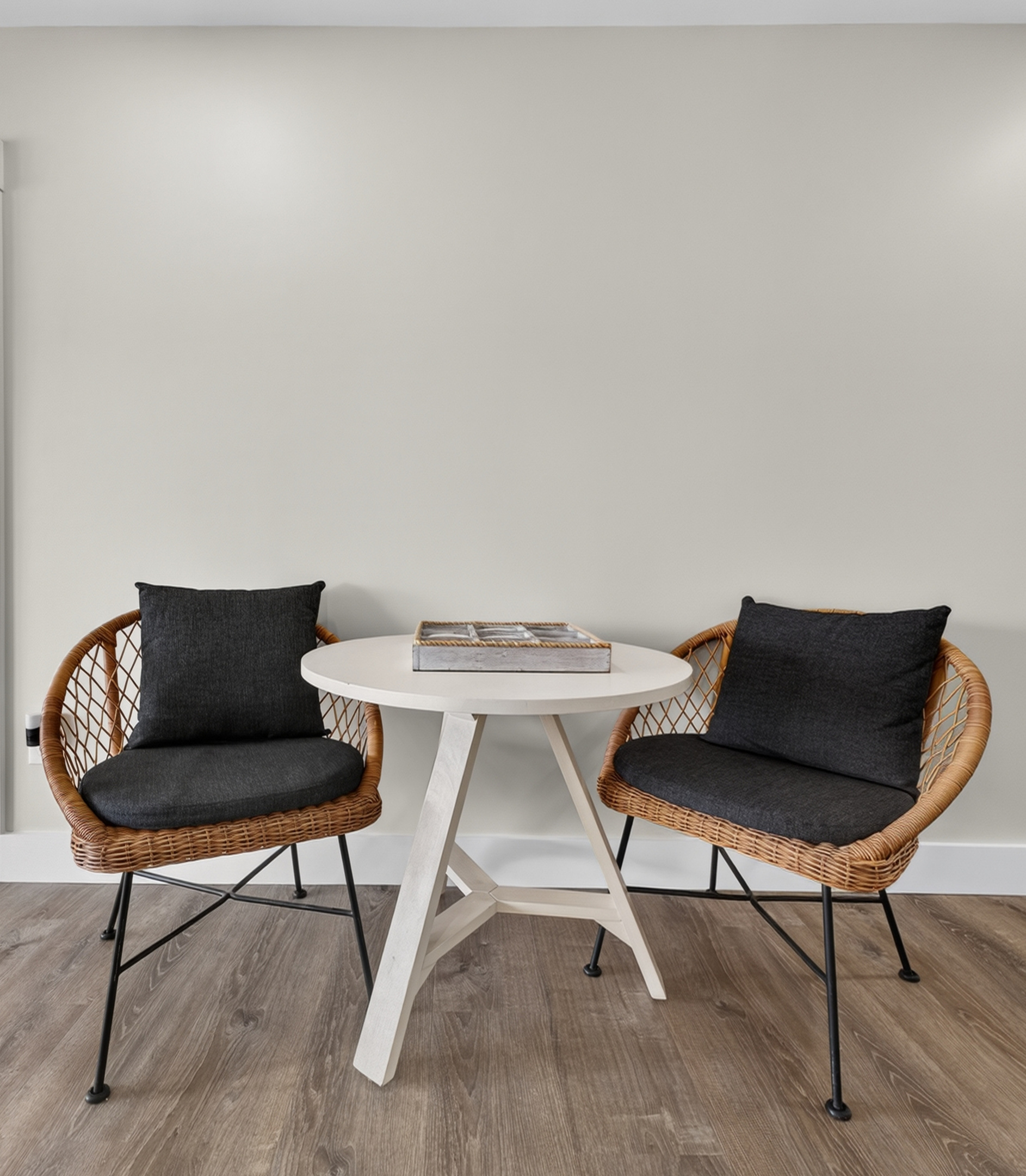 Intimate breakfast nook with modern chairs, perfect for morning coffee or casual meals.