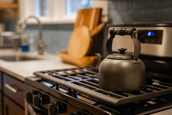 Cutting Boards & Tea Kettle 
-Overlooking The Charming Back Patio