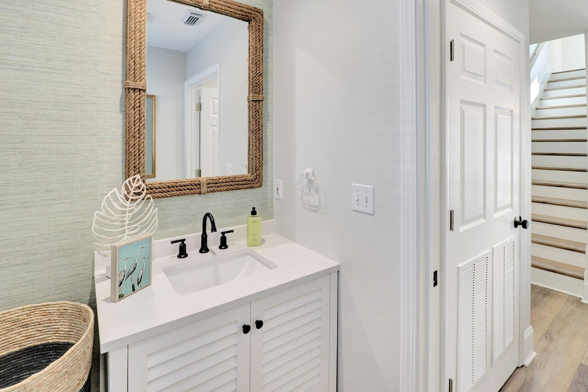 Your powder room keeps the main floor self-contained &mdash; guests have their own space.