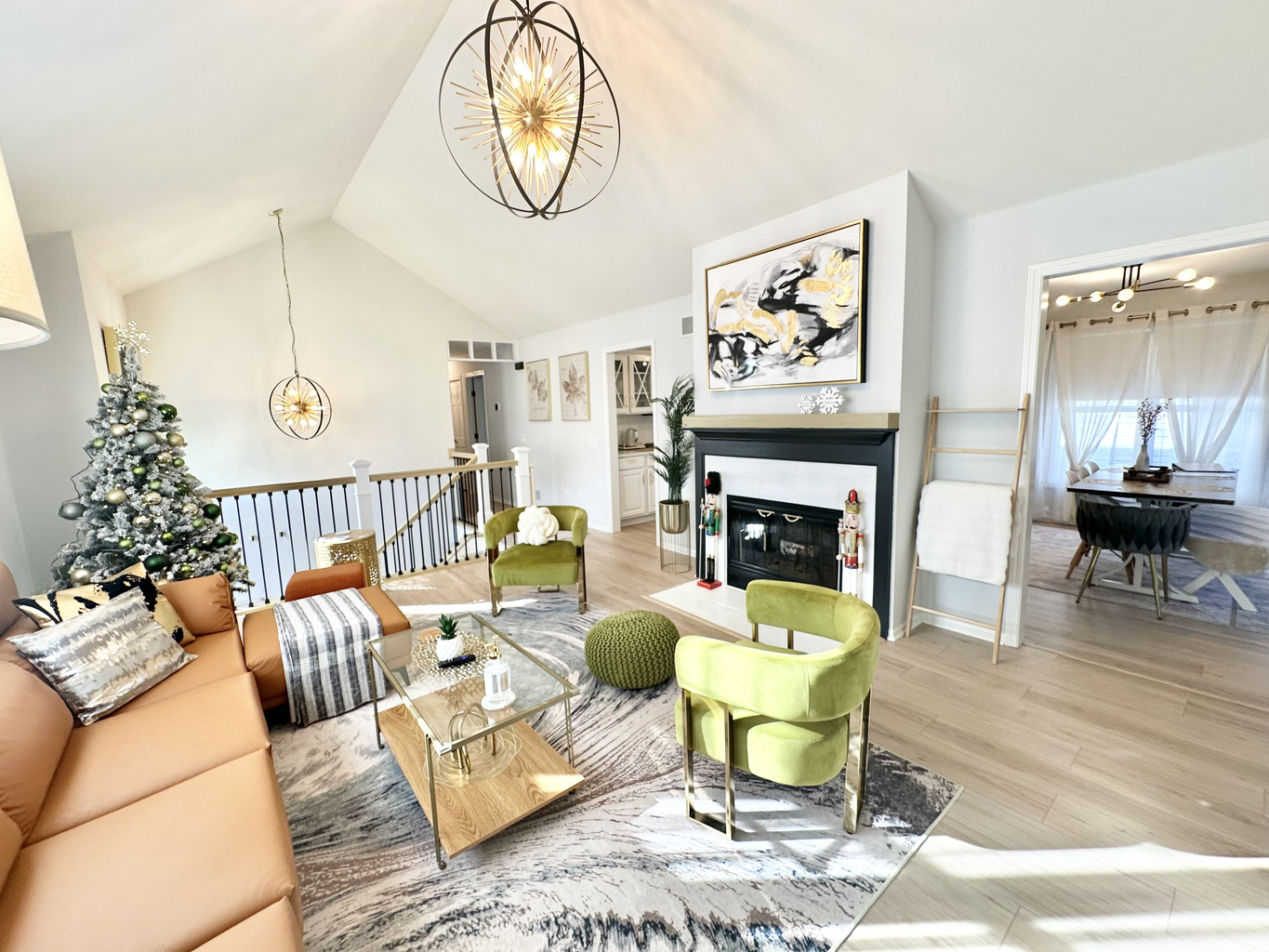 Beautiful living room with soaring vaulted ceilings. A festive Christmas tree will be set up for the holiday season! 🎄