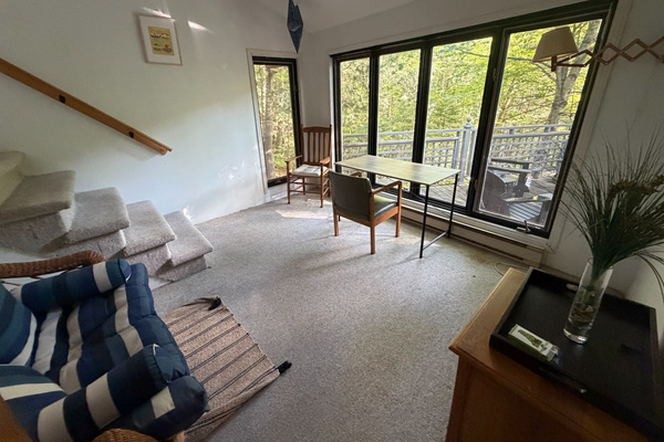 Seating area below for master bedroom suite