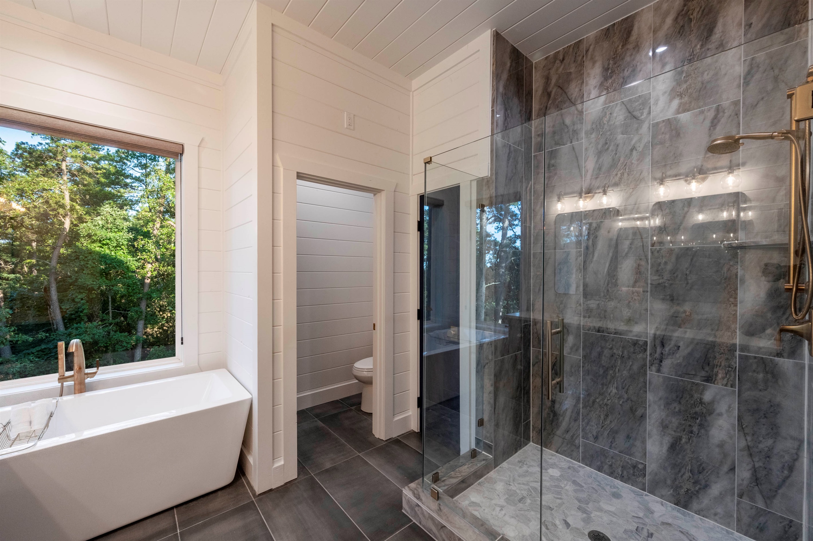 Spa-inspired walk-in shower with modern tile design and tranquil atmosphere