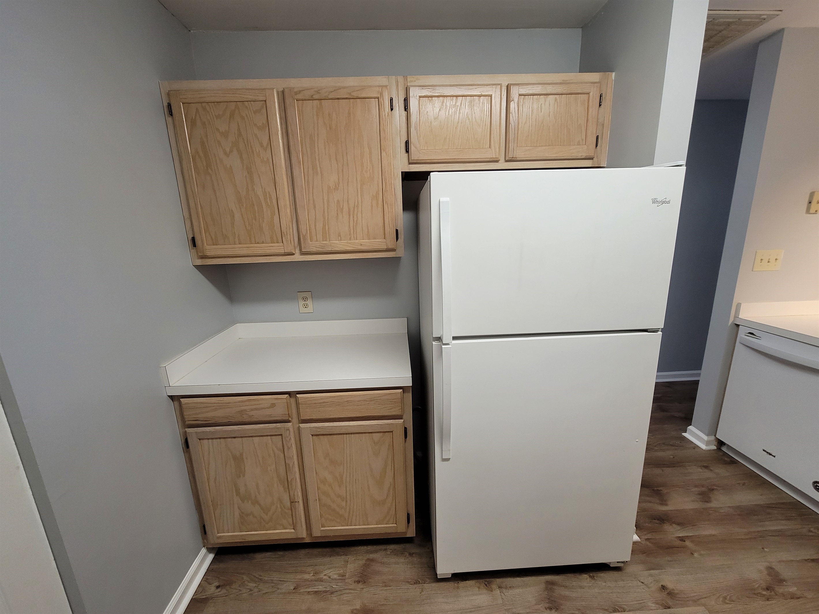 Full refrigerator and freezer with ice maker.