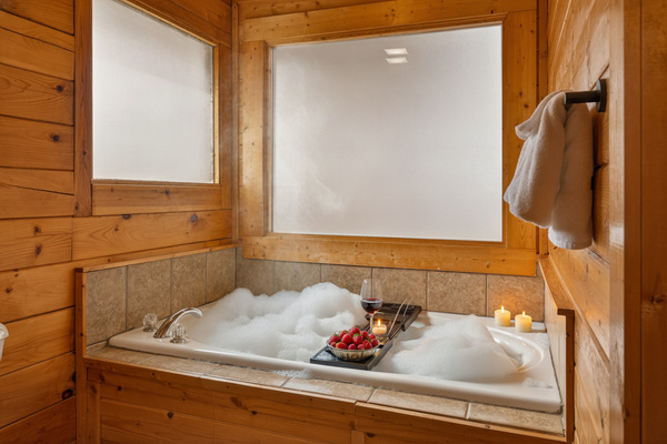 Kids asleep? Tub's calling. 🛁🍷