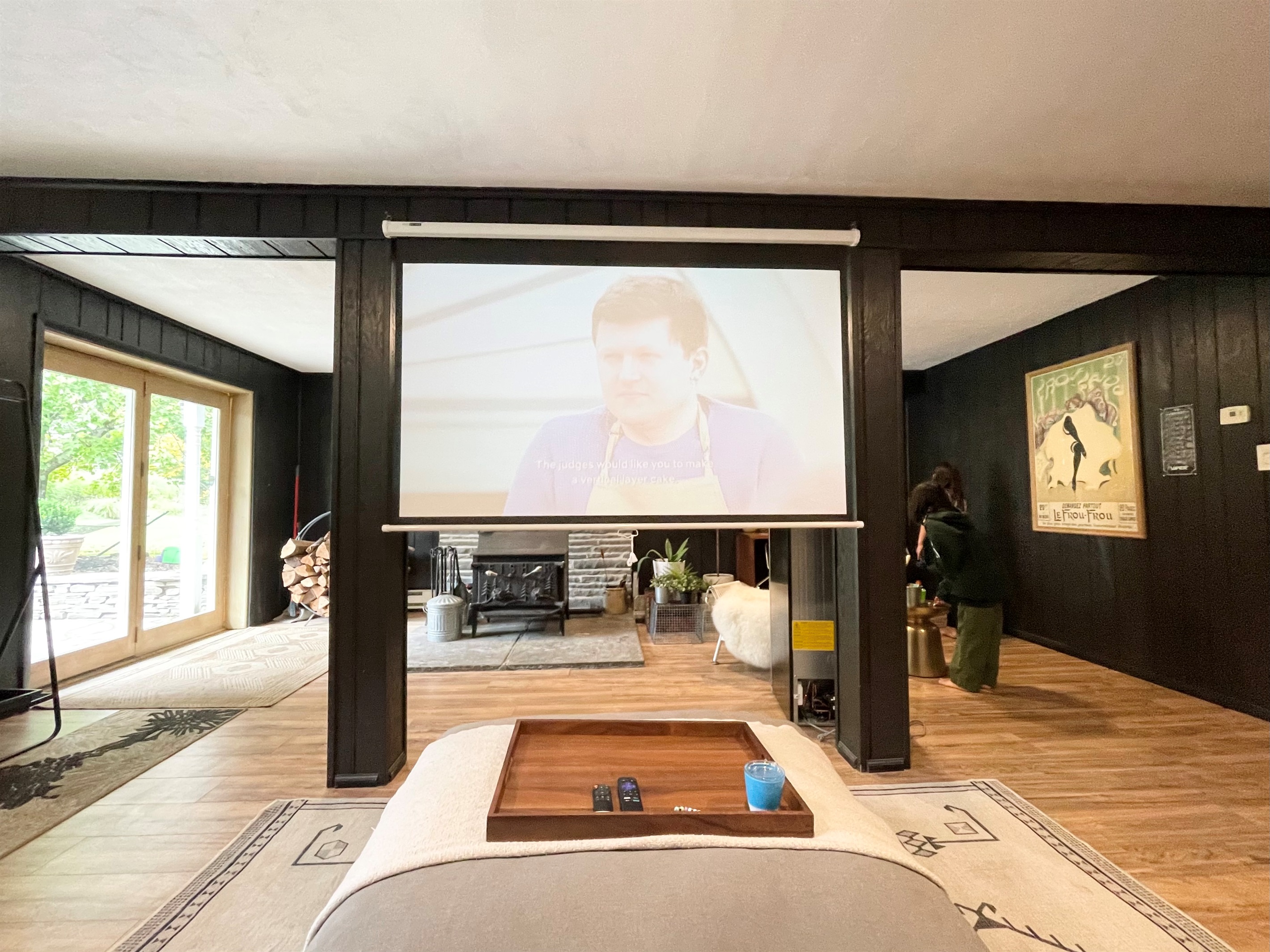 Family with projector and 100" screen