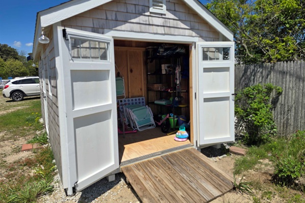 The shed is fully stocked with beach essentials for your convenience.