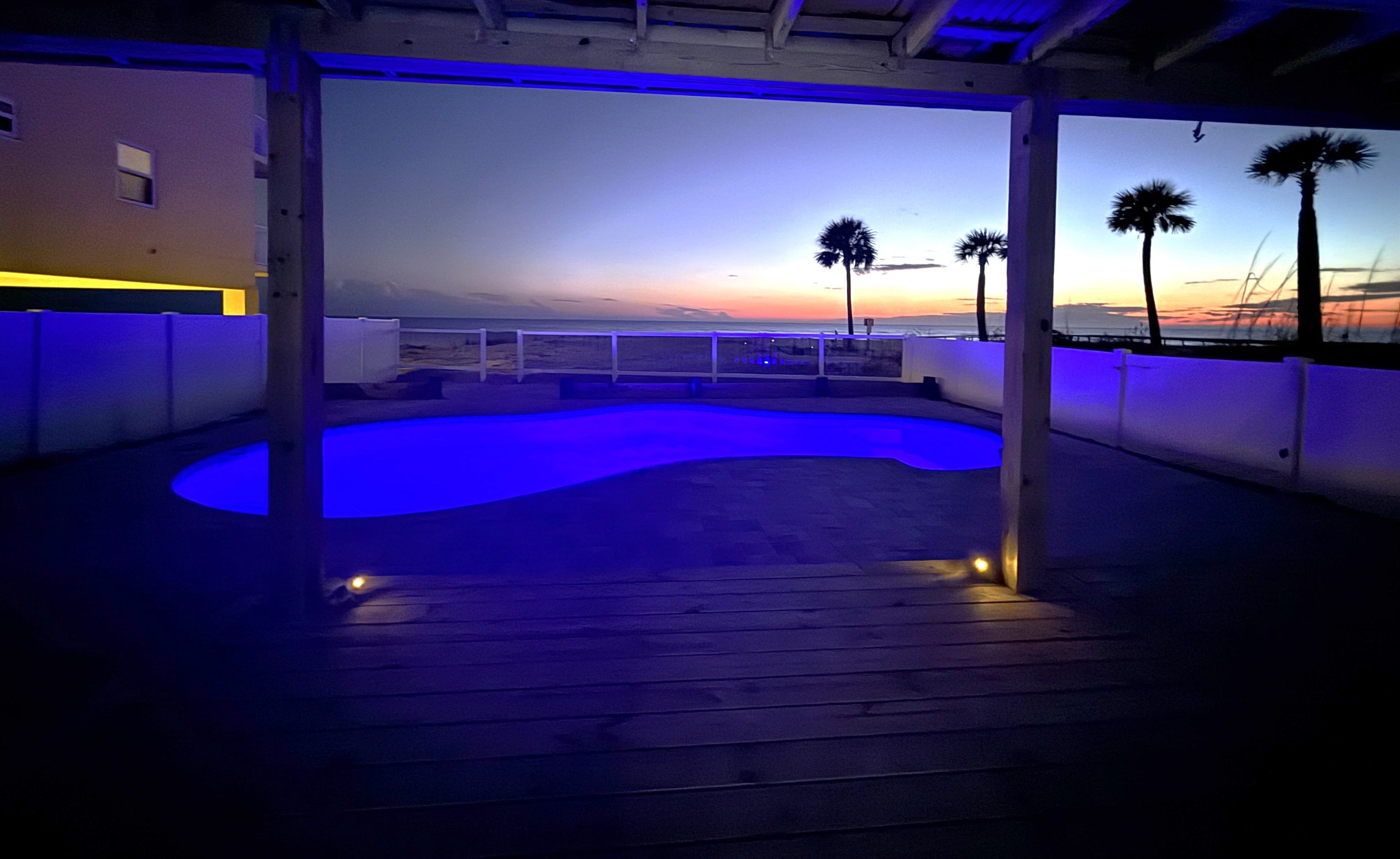 Beautiful Sunsets and a Beach View off your Private Deck Overlooking a Pool.