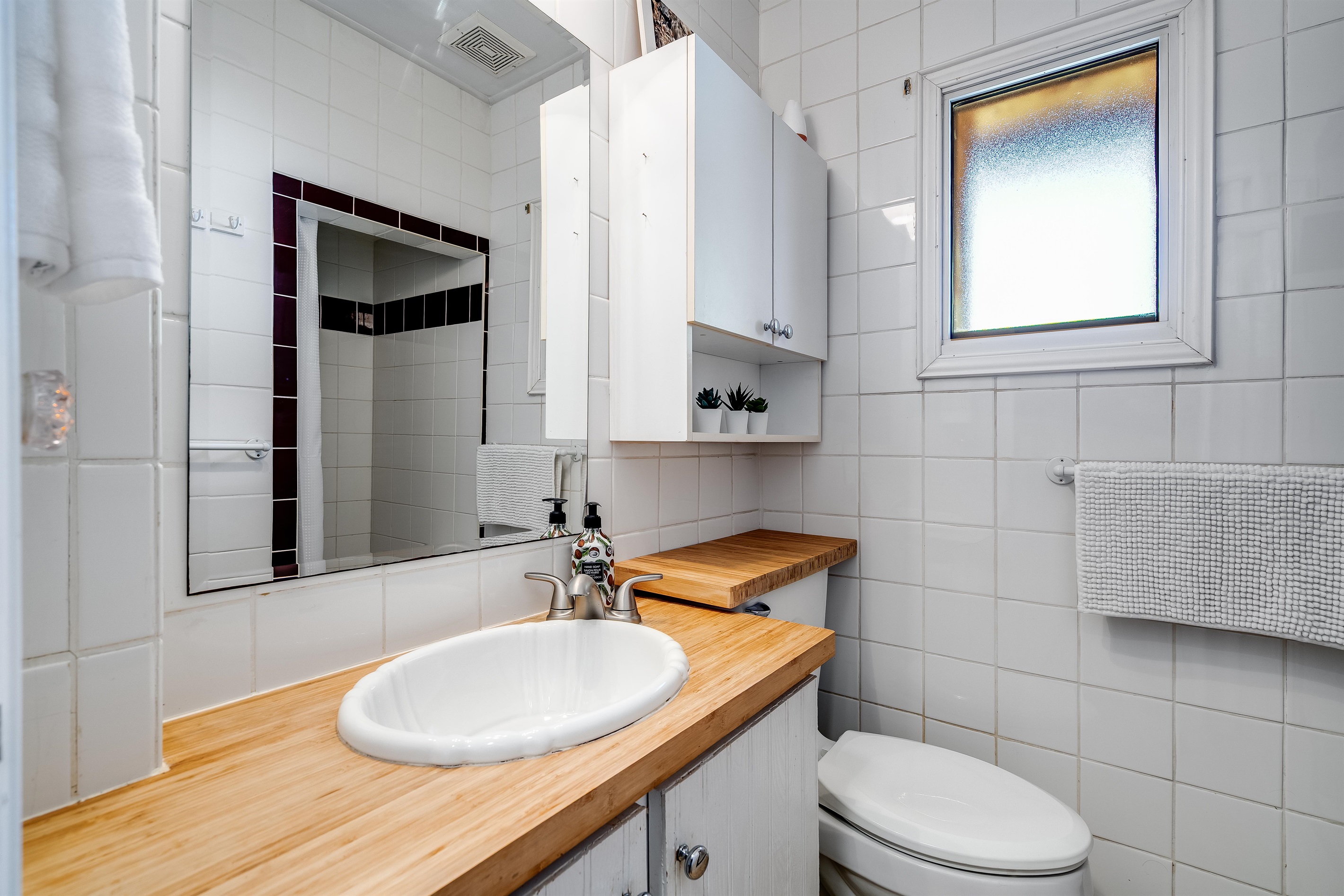 A bathroom that glistens with hotel-inspired luxury.