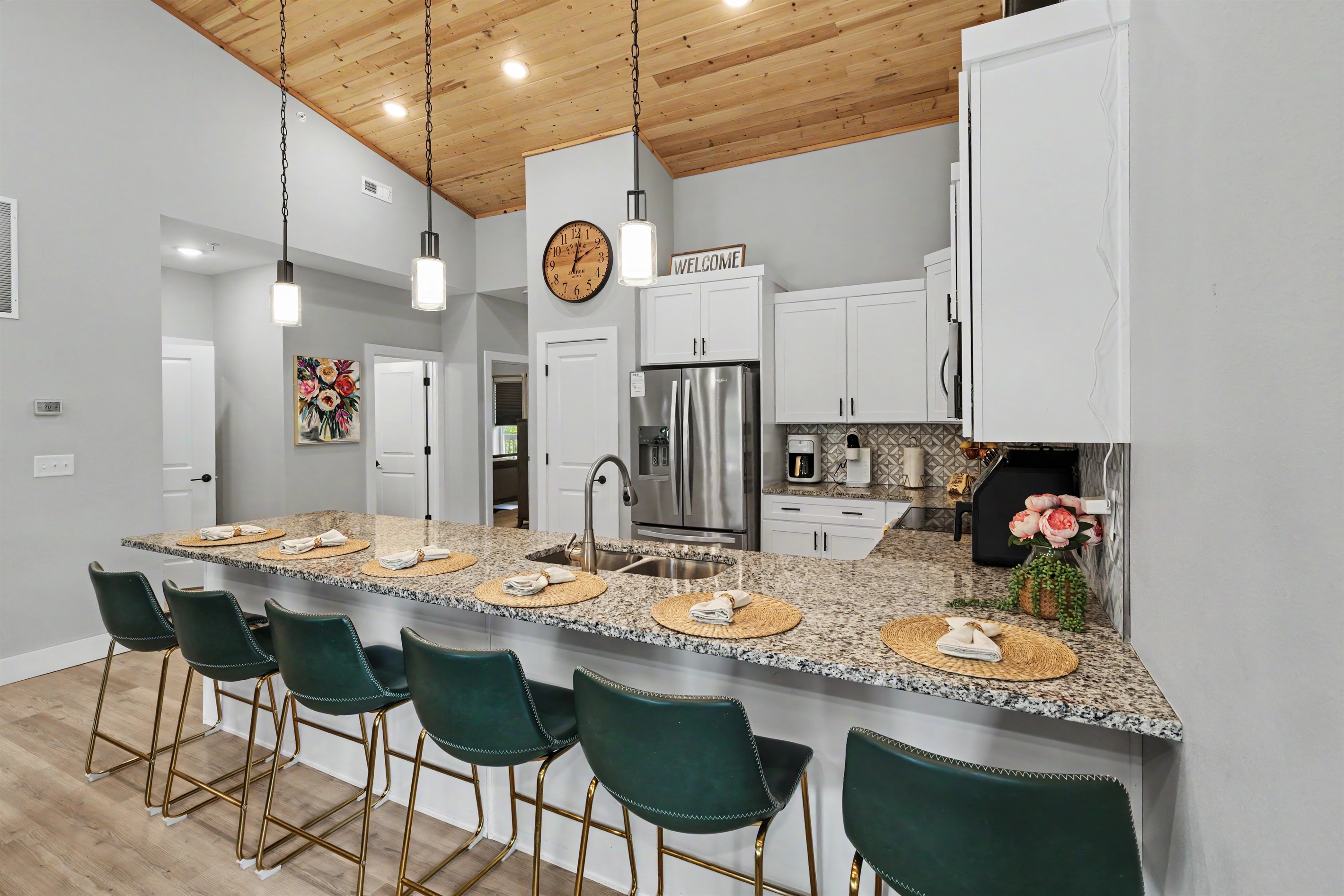 Breakfast bar seating for six, perfect for sleepy-eyed pancake mornings cereal debates, coffee refills, and late-night ice cream runs.