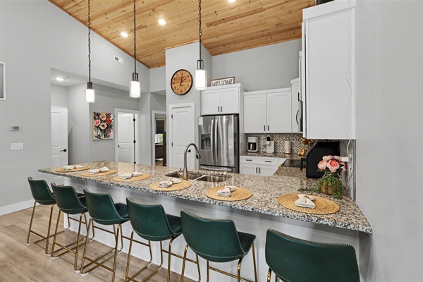 Breakfast bar seating for six, perfect for sleepy-eyed pancake mornings cereal debates, coffee refills, and late-night ice cream runs.
