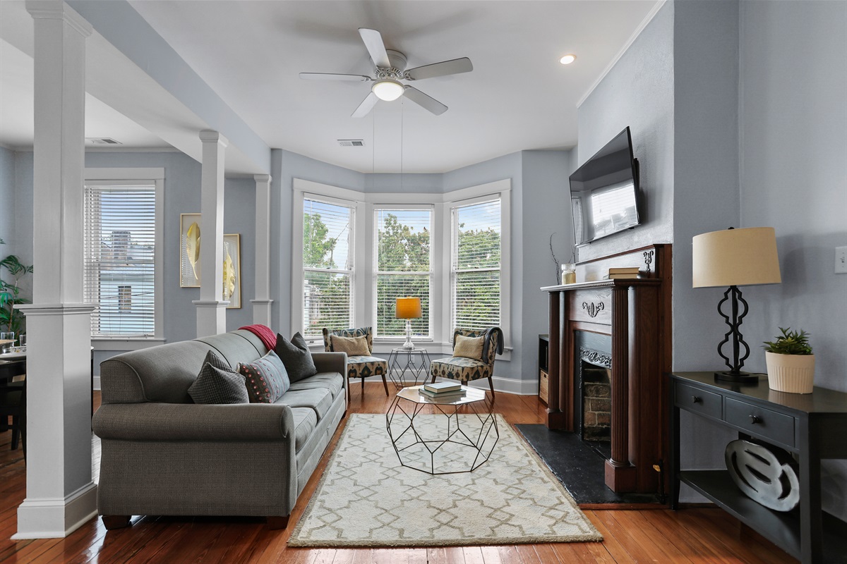 Grand ceilings, crown molding, and a cozy fireplace—your Savannah stay starts here.