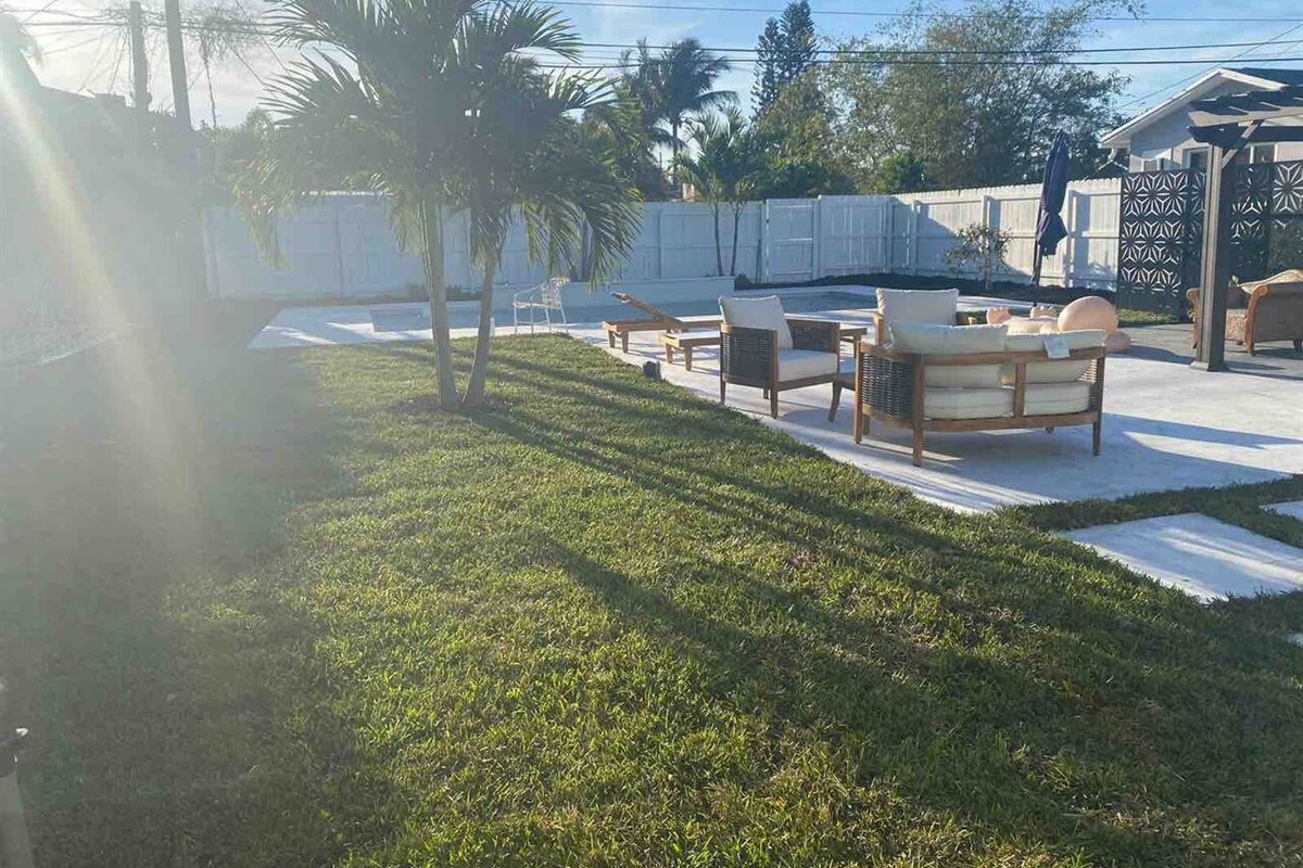 Relax in the backyard hammock, the hot tub or under the pergola.