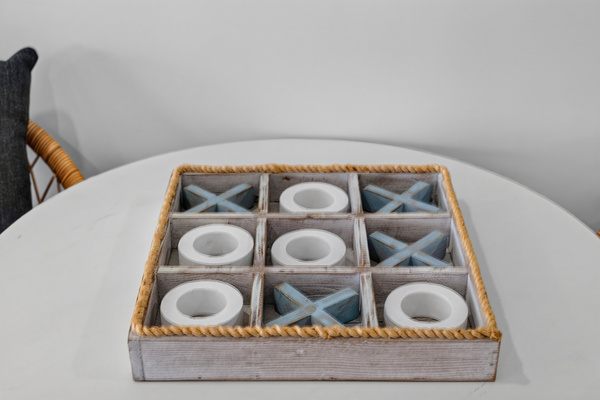 Complimentary tic-tac-toe game set, thoughtfully provided for family-friendly entertainment and fun during your stay.
