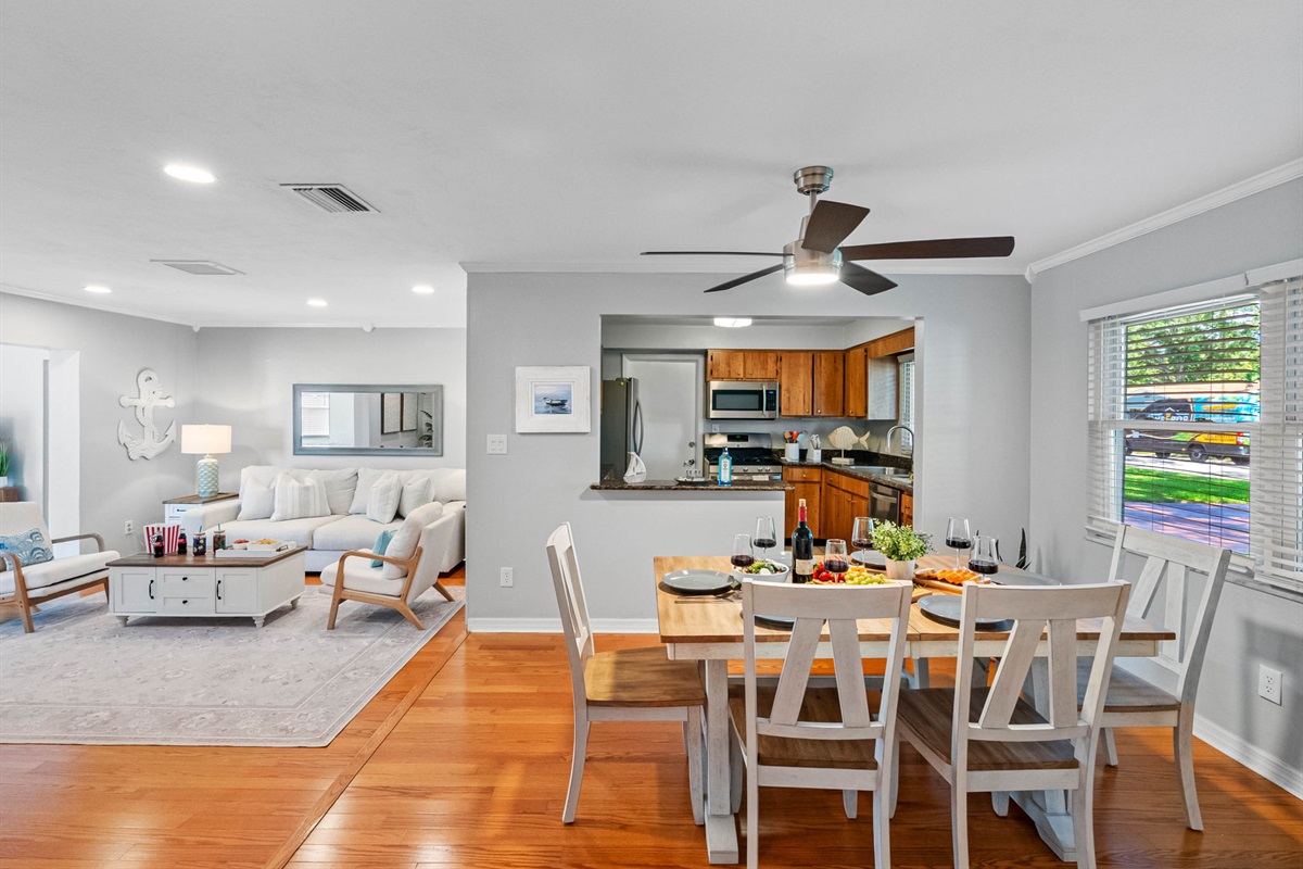 Cozy up to conversation in this light-filled dining area nestled between the living room and kitchen.