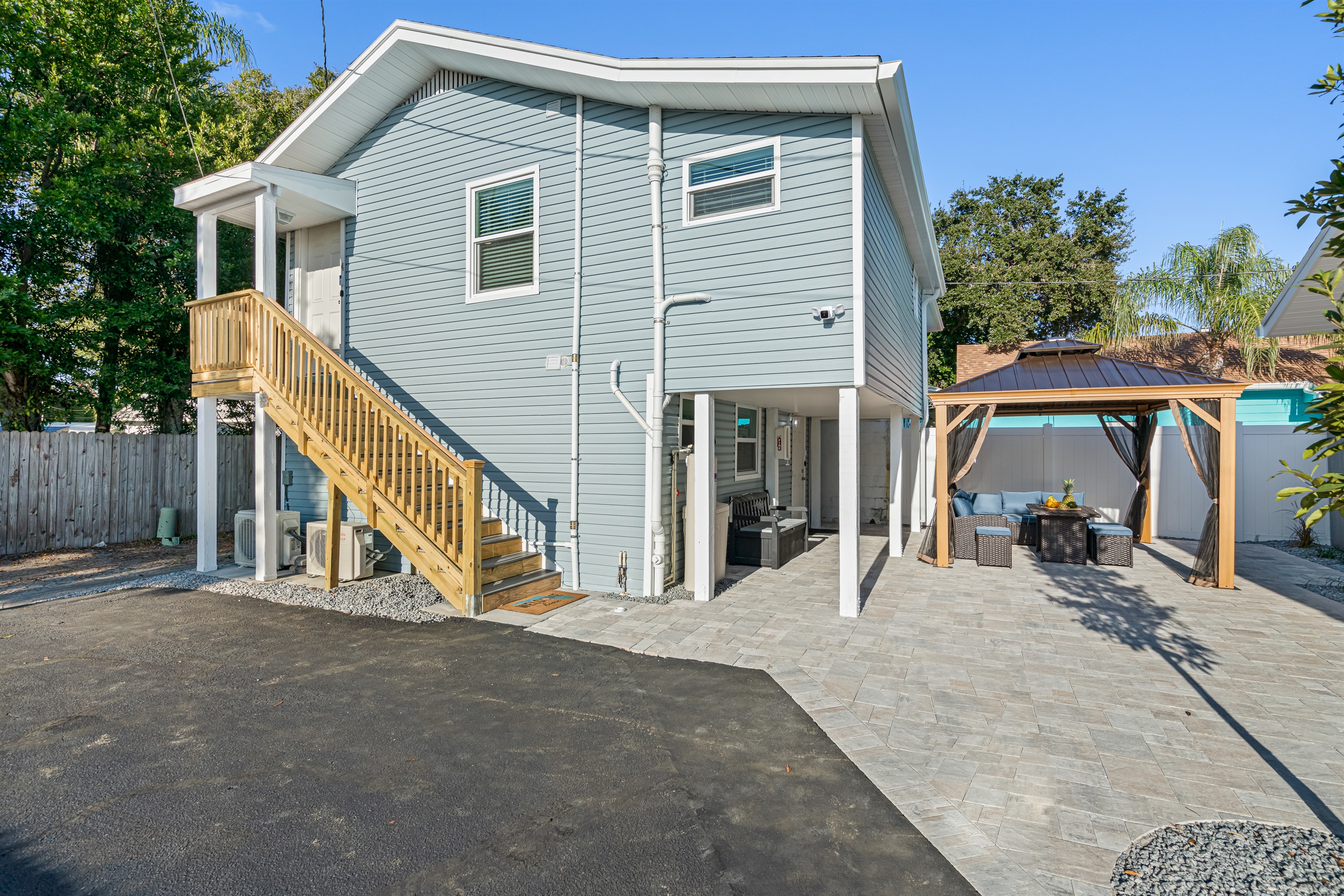 The beautiful front view of the house showcases our beautiful gazebo and driveway. If you are interested in this property, send us a message! Book now!