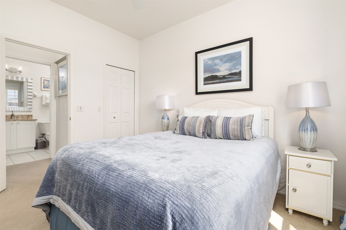 The first floor queen bedroom is just across the hall from the first floor share bath.