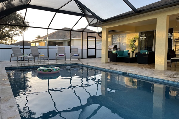 The pool is about 5 feet deep & features a comfortable sitting ledge for relaxing.