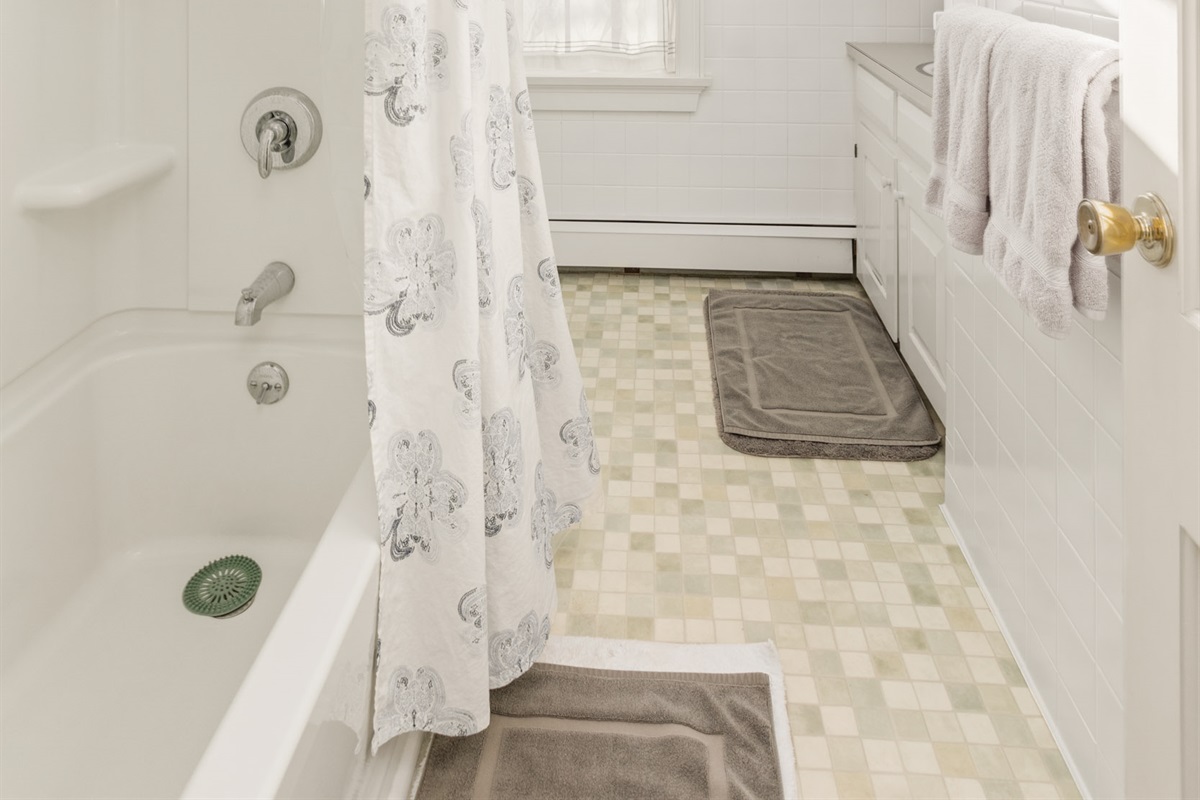 Shared Bathroom at top of landing including standard tub