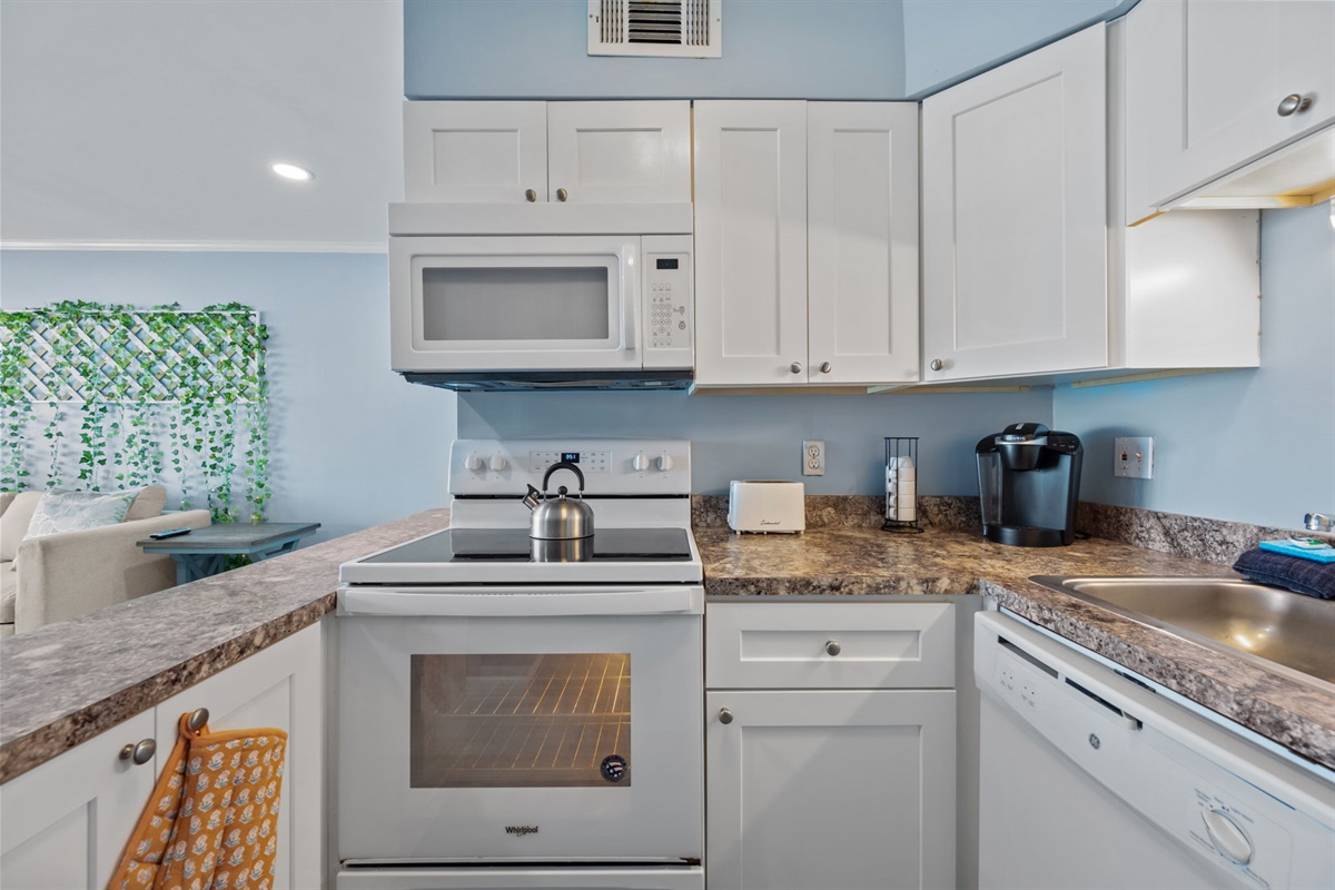 Compact kitchen equipped for everything from quick breakfasts to full meals