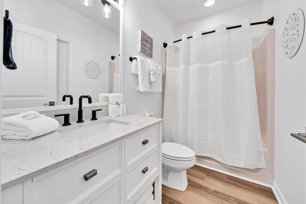 This second-floor bathroom has one of two bathtubs