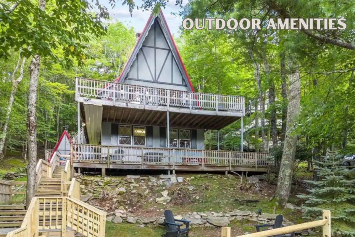 This charming A-frame cabin boasts spacious decks, comfortable seating, a fire pit, grill, and hot tub, ensuring a memorable outdoor experience.