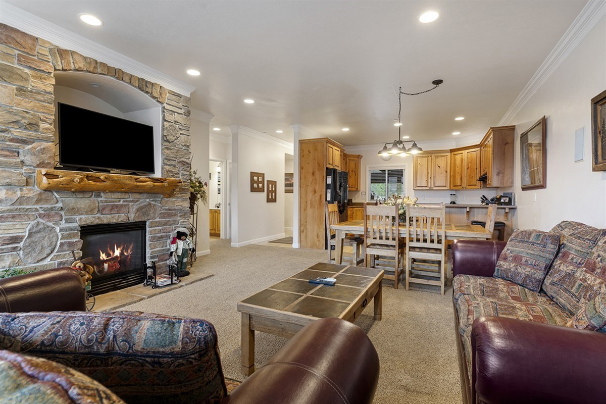 Cozy seating, fireplace warmth, and space for everyone to unwind together.