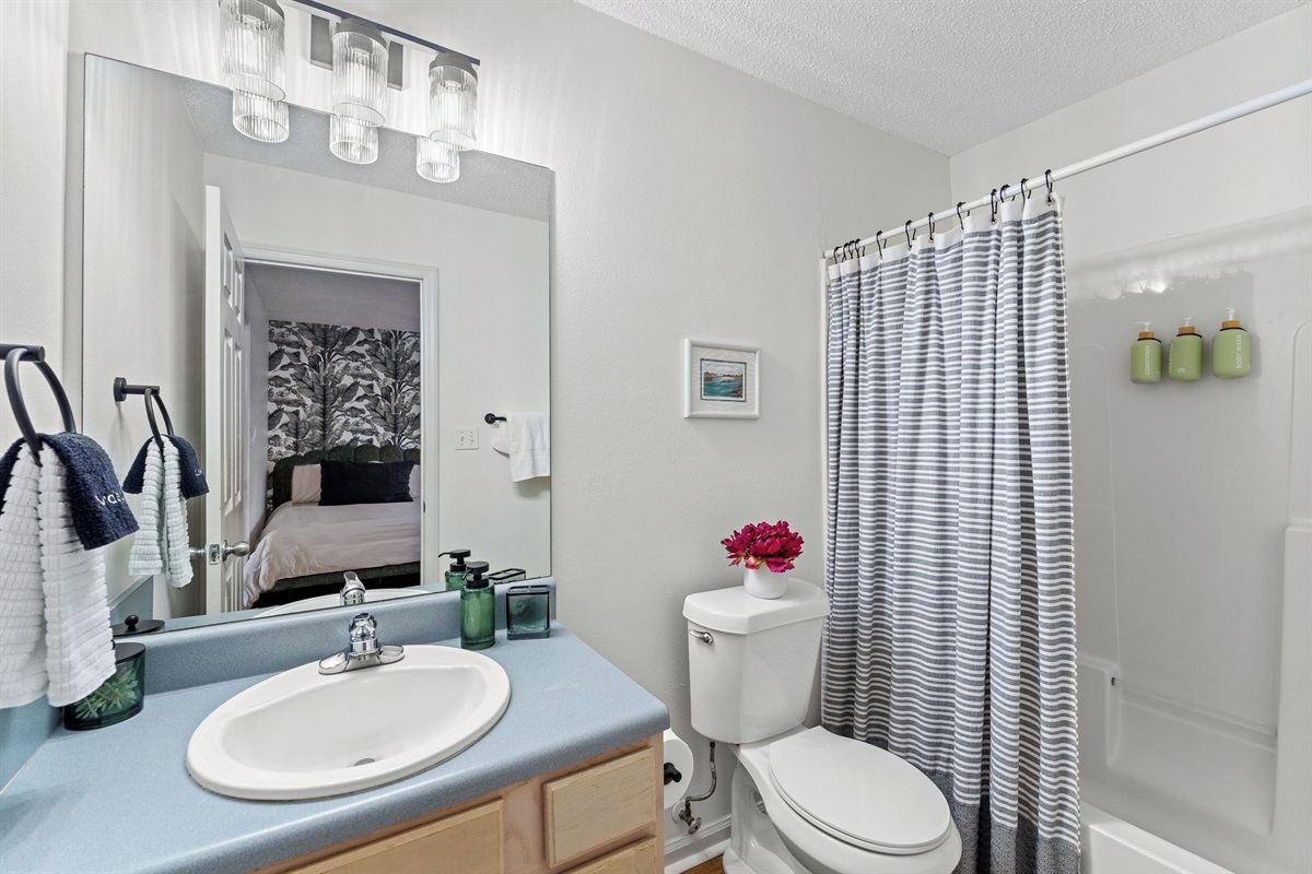 Full bathroom attached to the secondary bedroom. Bathrooms come stocked with the