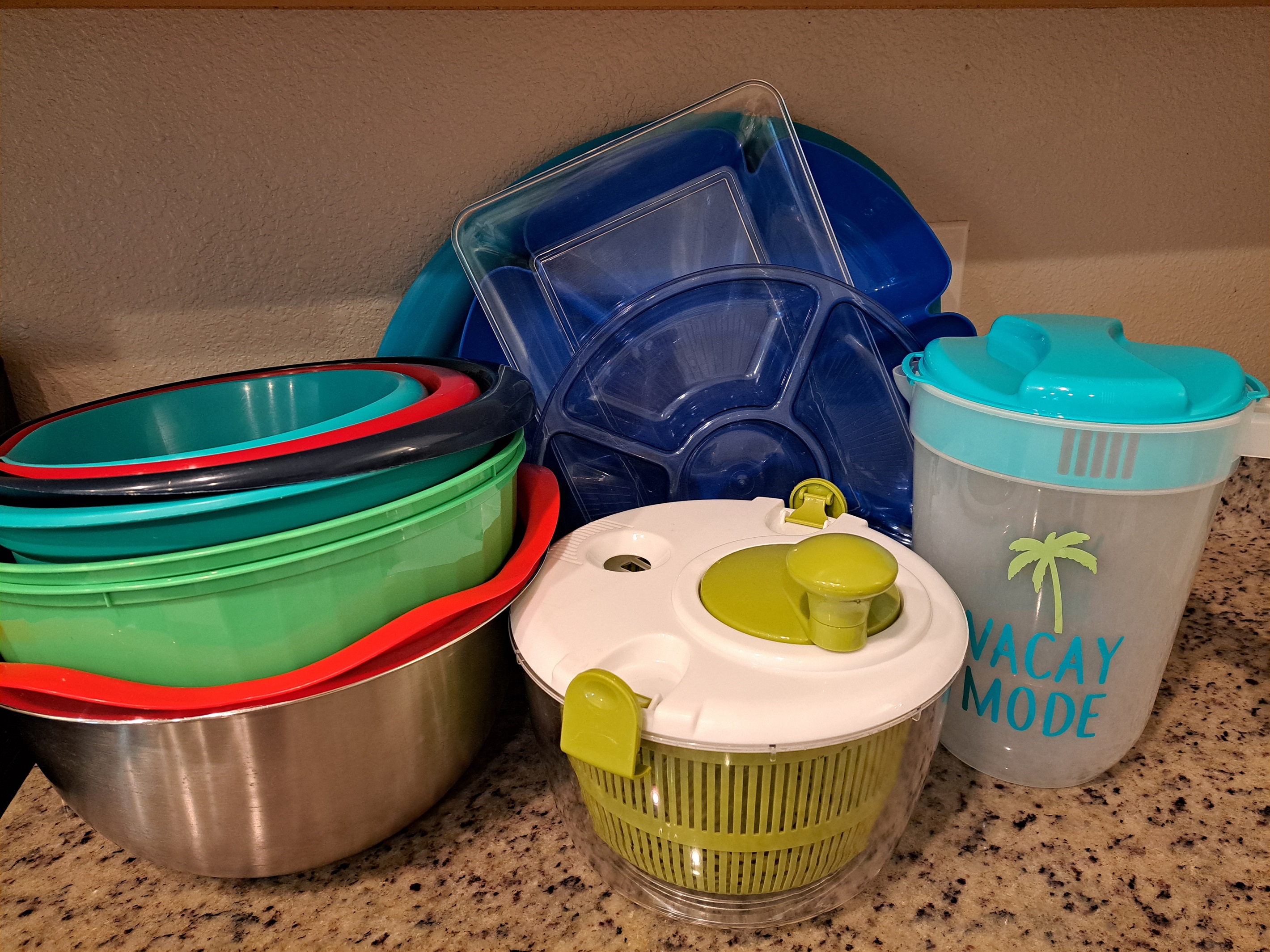 Juice jug, salad spinner, veggie platters, mixing bowls