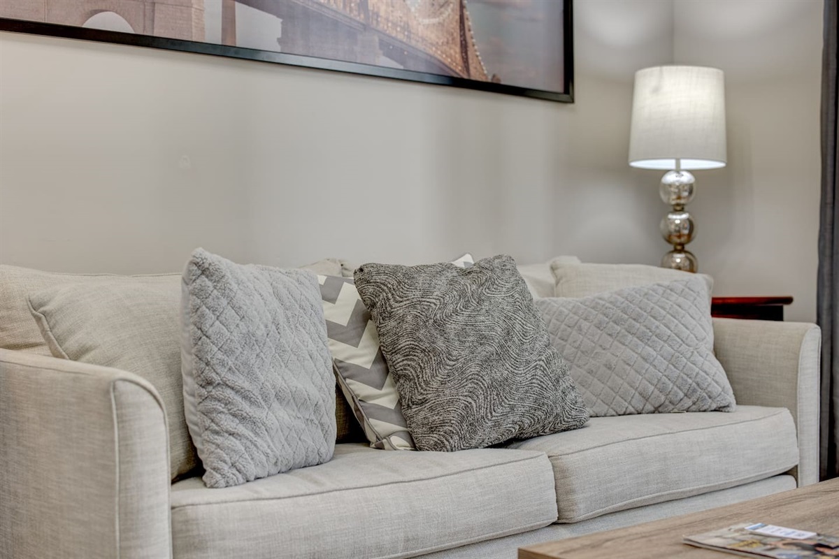 The living room area comfortably seats 2-3.