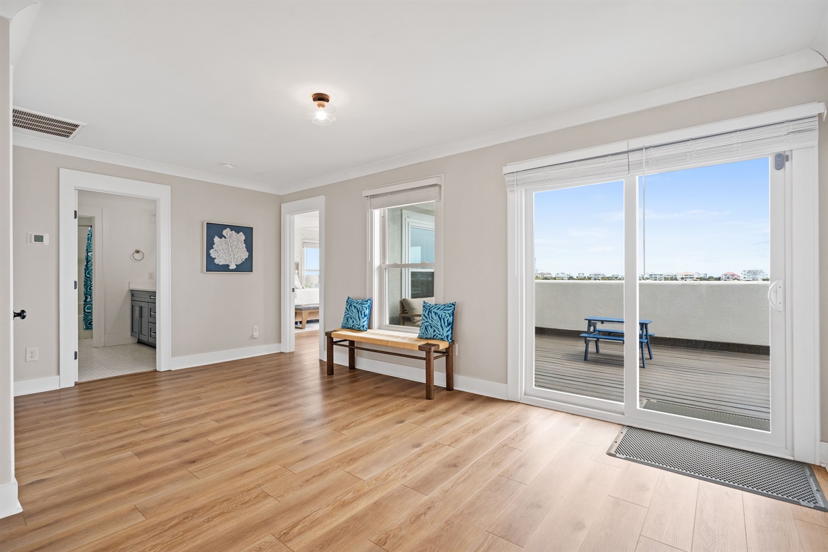 Bright and spacious second-level living area with private deck access and plenty of room to relax