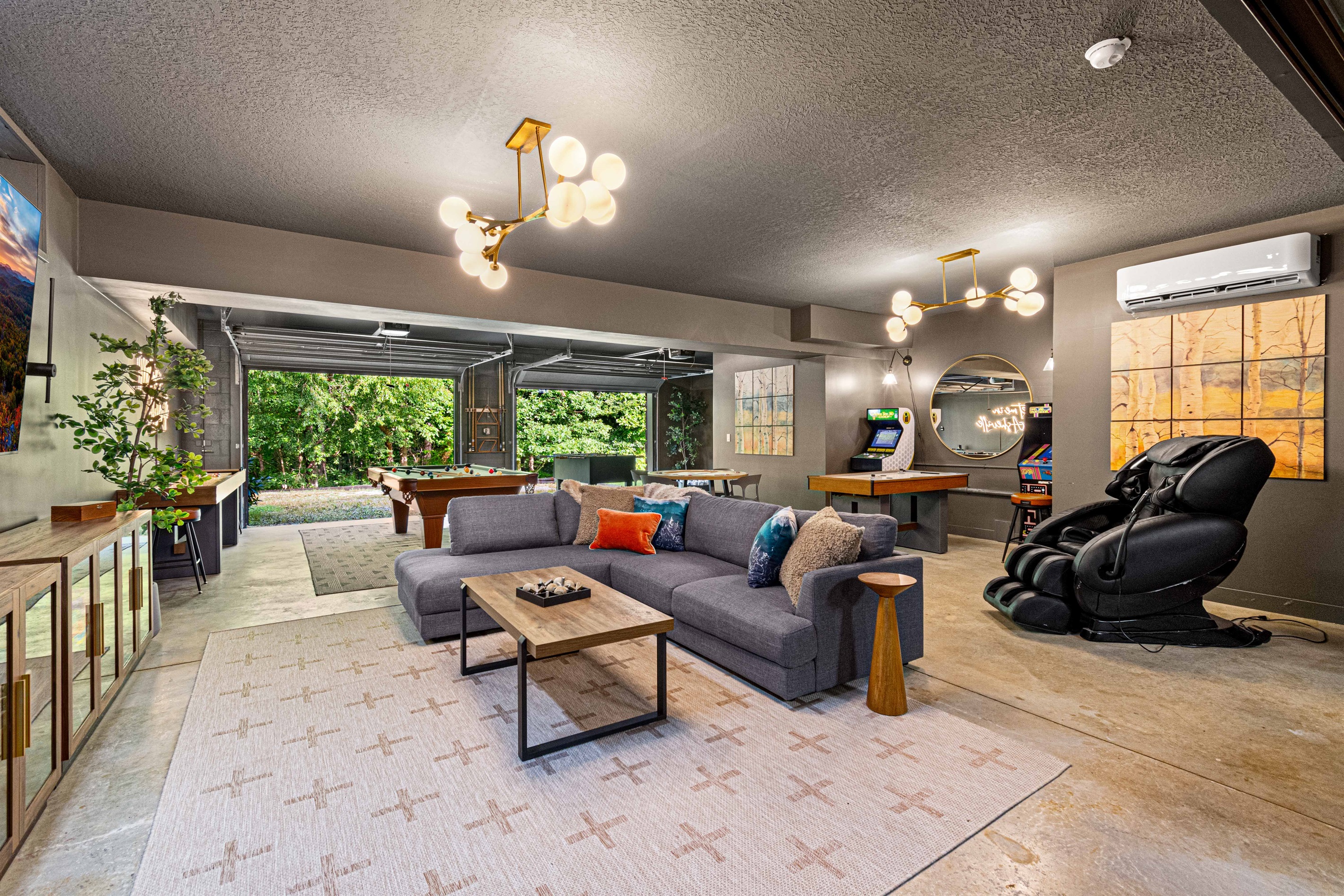 Step into the ultimate game room - challenge friends at pool or arcade classics, sink into the massage chair, or open the garage doors to let the mountain air in. Pool table, movie theatre, foosball, shuffleboard, poker, mah jongg, arcades, & 85" TV