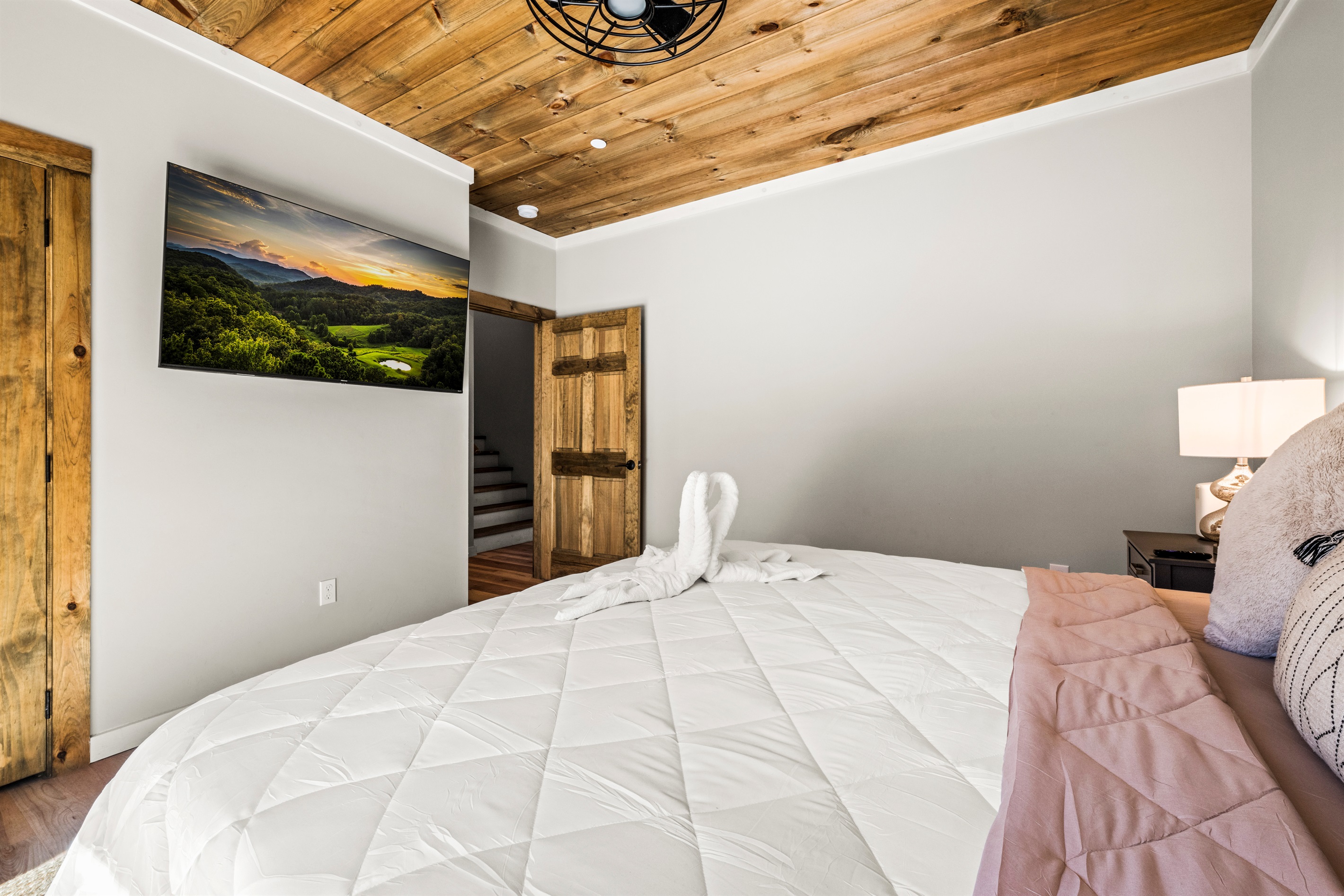 This master bedroom (king) is located on the main floor of the cabin.