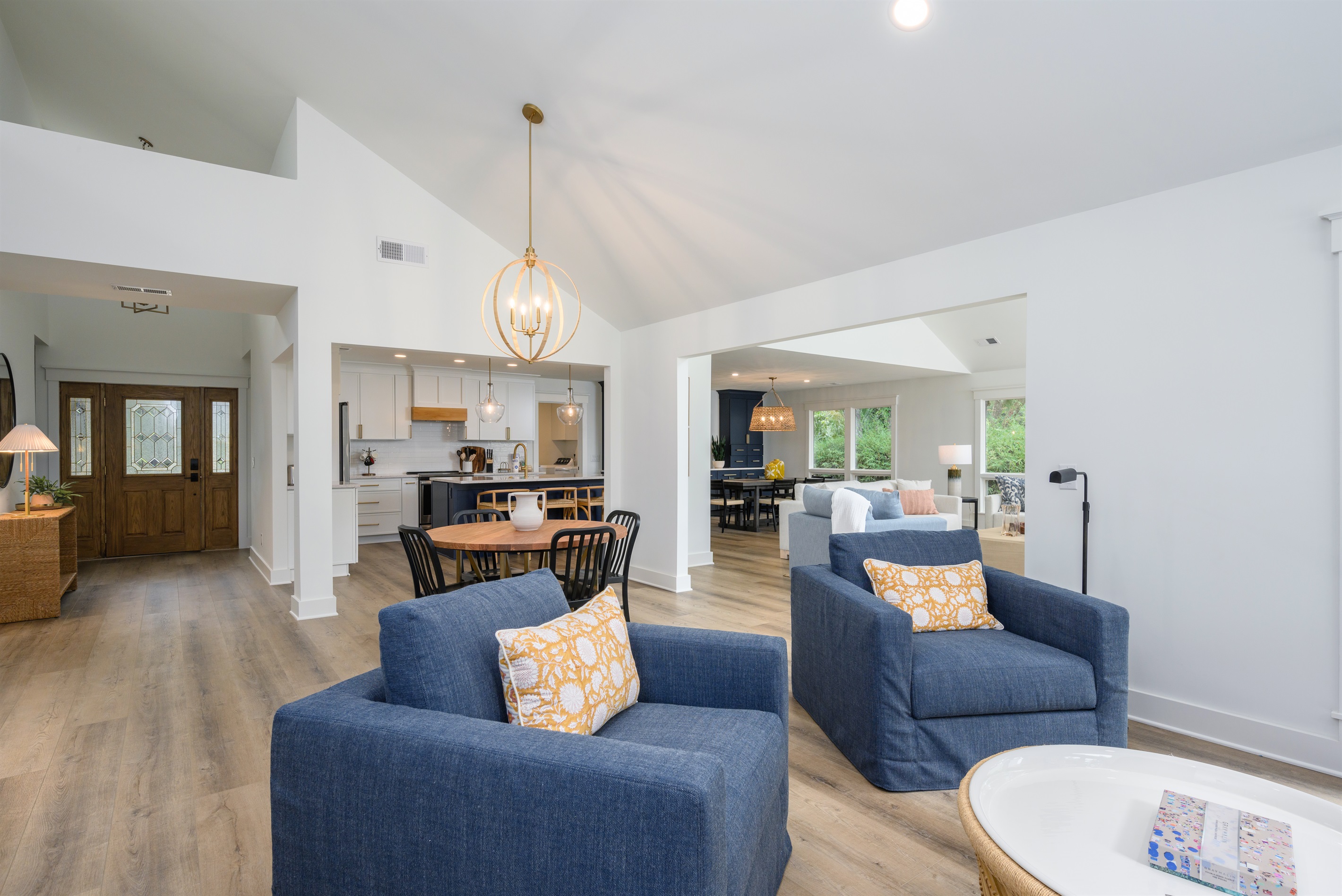 View from living room to kitchen and family room.  The open floorplan is amazing!