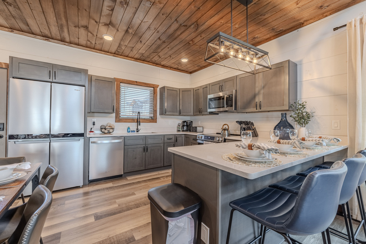 Fully equipped kitchen with full-size appliances and generous counter space.