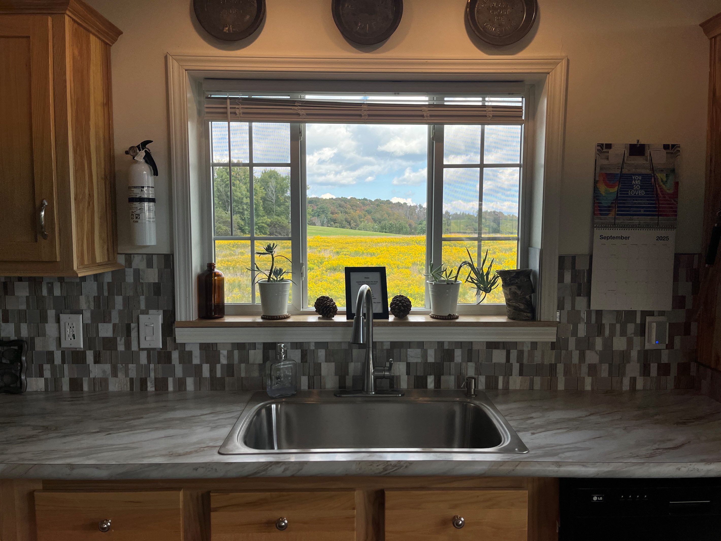 New kitchen with stainless steel applicances