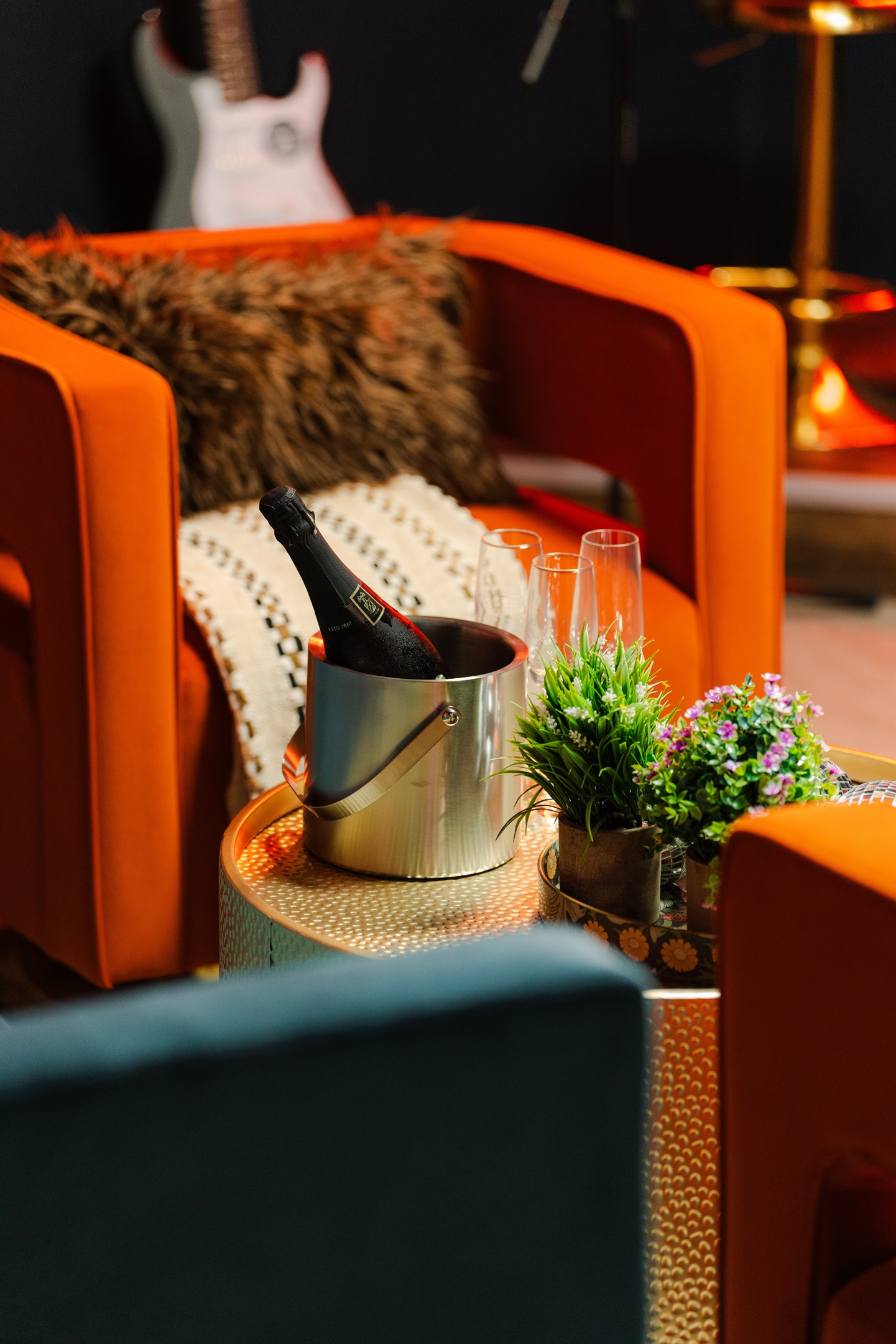 Pop a bottle and kick back in this fun little lounge spot.