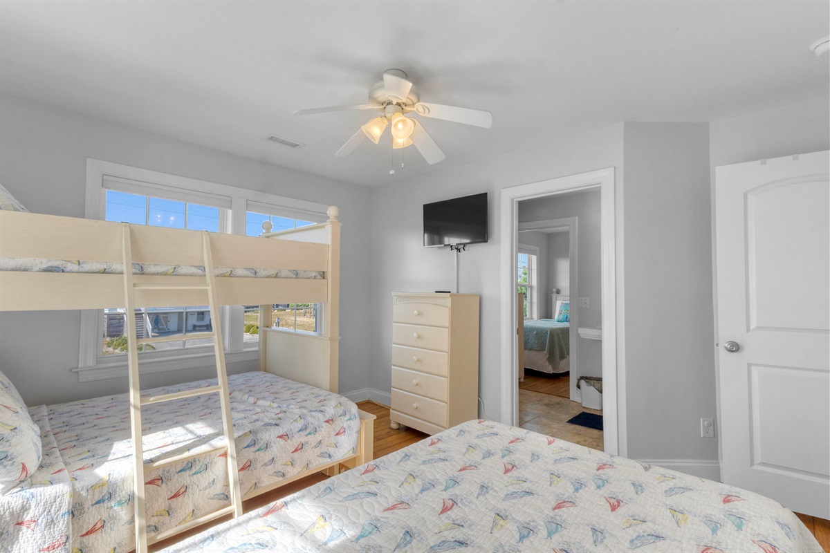 This room has a twin bed and a twin over full bunk bed. As well as a tv with ROKU streaming.