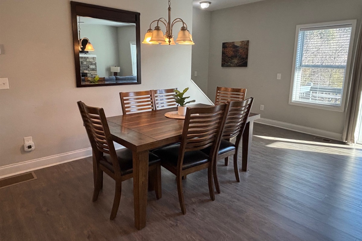 Plenty of seating at the dinner table overlooking the kitchen and living room!