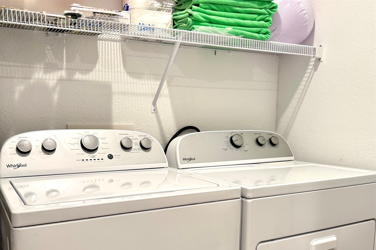 Washer and dryer in laundry room.