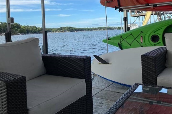Come on down to the concrete dock and enjoy the kayaks or paddle boards, or just sit and relax and watch the boats. See views of Monkey Island and the main channel from Buck Creek Cove.