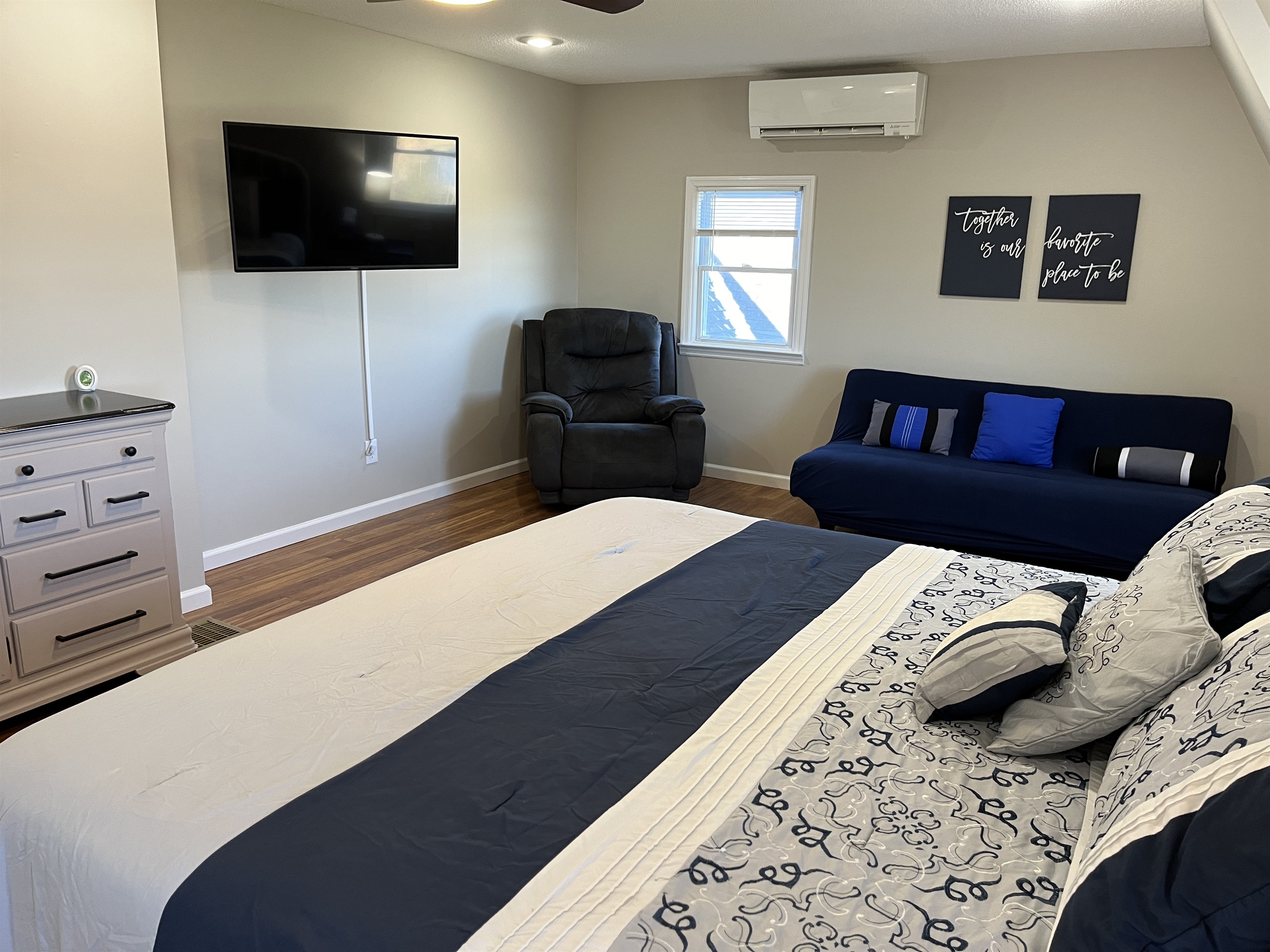 Hilltop Hideaway 2nd Floor bedroom #5 with smart TV and AC.