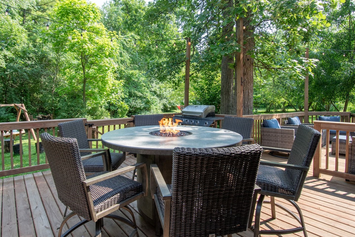 Enjoy the wooded setting while listening to the numerous birds on the gated deck right off the sunroom.