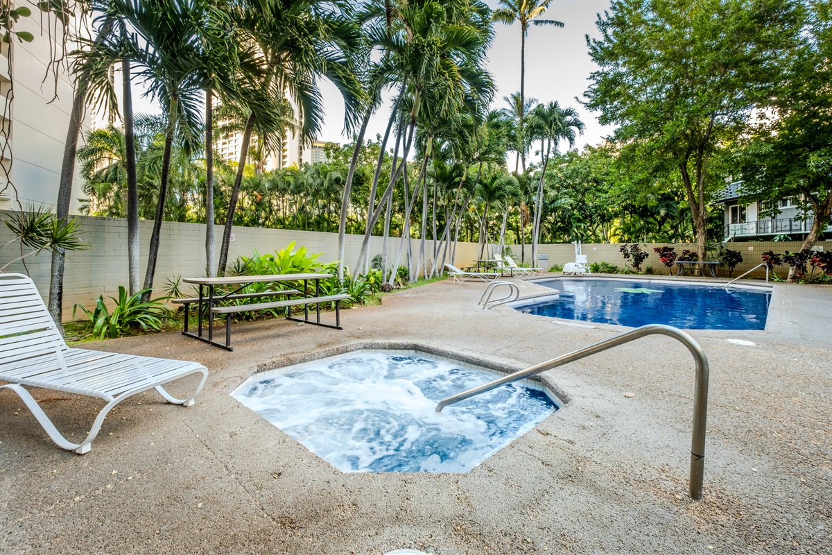 Relax and unwind by the sparkling pool and soothing hot tub, surrounded by tropical greenery and island breezes. Perfect for a refreshing dip after a day exploring Waikīkī’s beaches and shops.