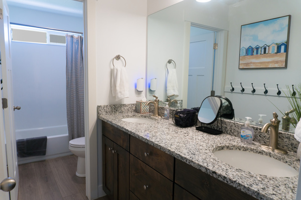 Upstairs bathroom with separate door for toilet and shower/tub