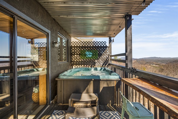 The hot tub deck is sure to be your favorite spot featuring endless views and plenty of room to relax